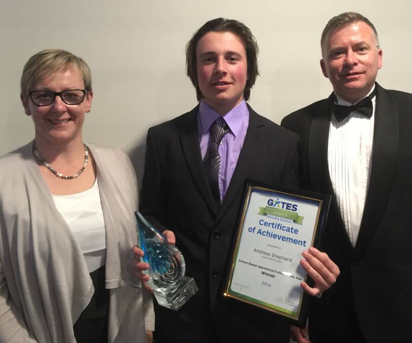BRIGHT FUTURE: Andreas Shepherd celebrates his School-Based Trainee of the Year award with Junee High careers adviser Elaine Bunyan and council GM James Davis.
