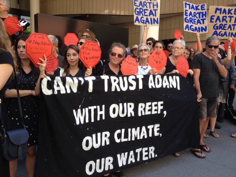 Protestors gather against Australia's involvement with the Adani Coal Mine.