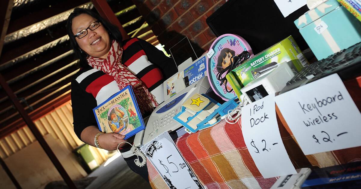 BAG A BARGAIN: Judith Clark prepares her home in Ashmont for this weekend's Garage Sale Trail. Picture: Laura Hardwick