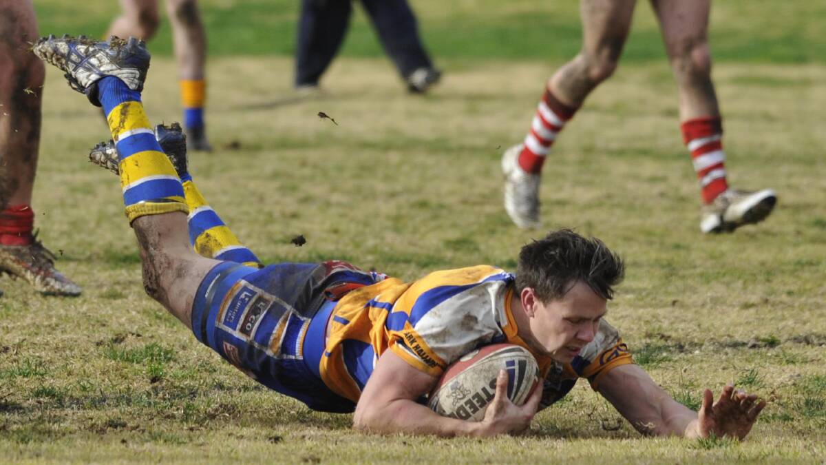 TRY TIME: Junee captain-coach Matt Hands dives over to score as his team come from behind to defeat Temora 34-22. Picture: Les Smith