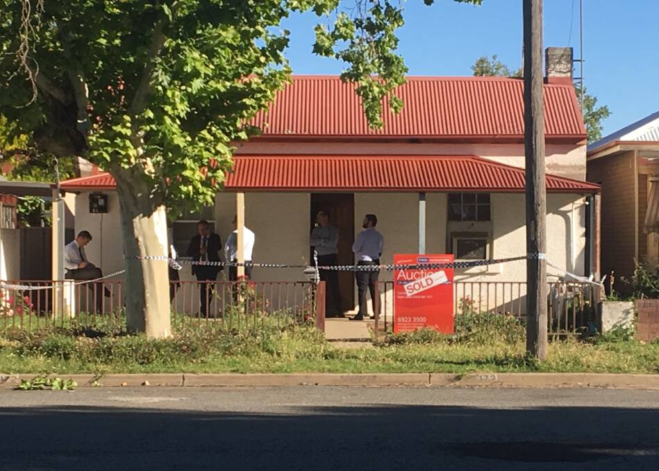 CRIME SCENE: Wagga detectives search a Gurwood Street house where a 19-year-old man was arrested on Tuesday afternoon. Picture: Kieren L Tilly