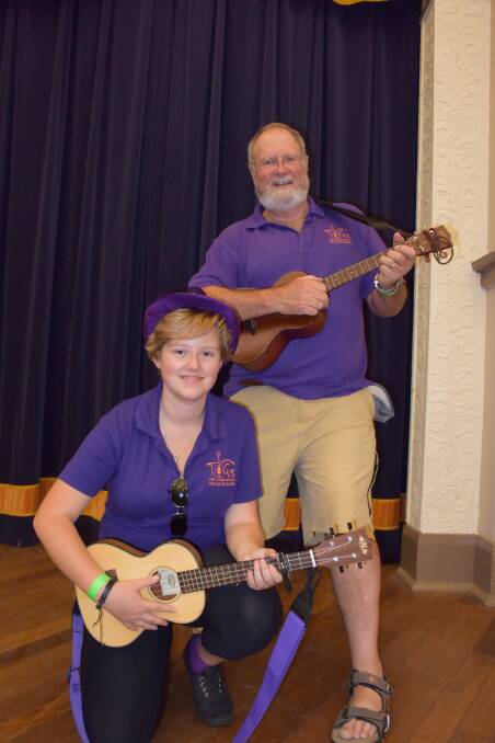 ROCKING OUT: Tugs Ukulele members Louise Cooke and Geoff Bairnsfather take the stage at the Junee Rhythm n Rail Festival. Picture: Olivia Shying 