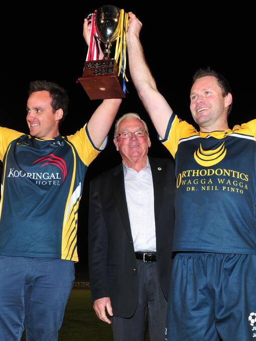 Isaac Cooper (left) holding the prestigious Pascoe Cup in 2015. Picture: Kieren L. Tilly