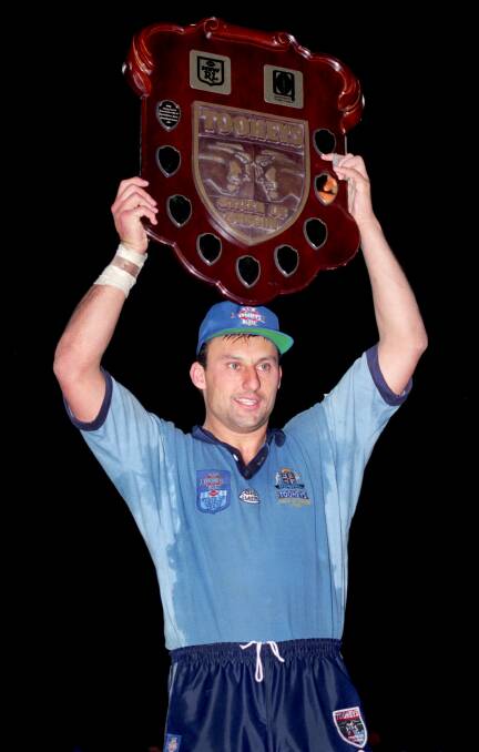 Daley hoists the trophy in 1994. The Junee junior and NSW coach had a rocky start to his own Origin playing career.