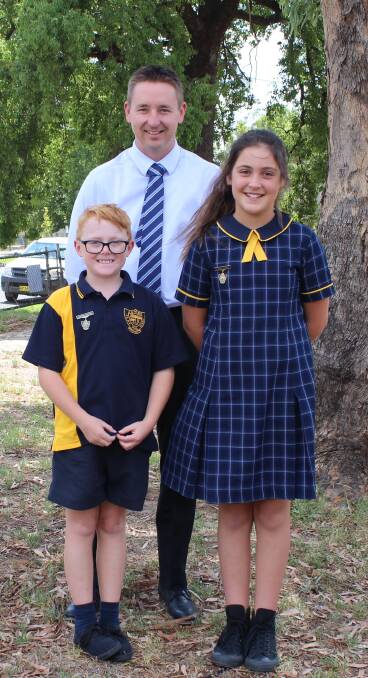 New leaders: The 2017 Junee Public school captains Jasper Makeham and Jazmin Gore with relieving principal Owen Gill.