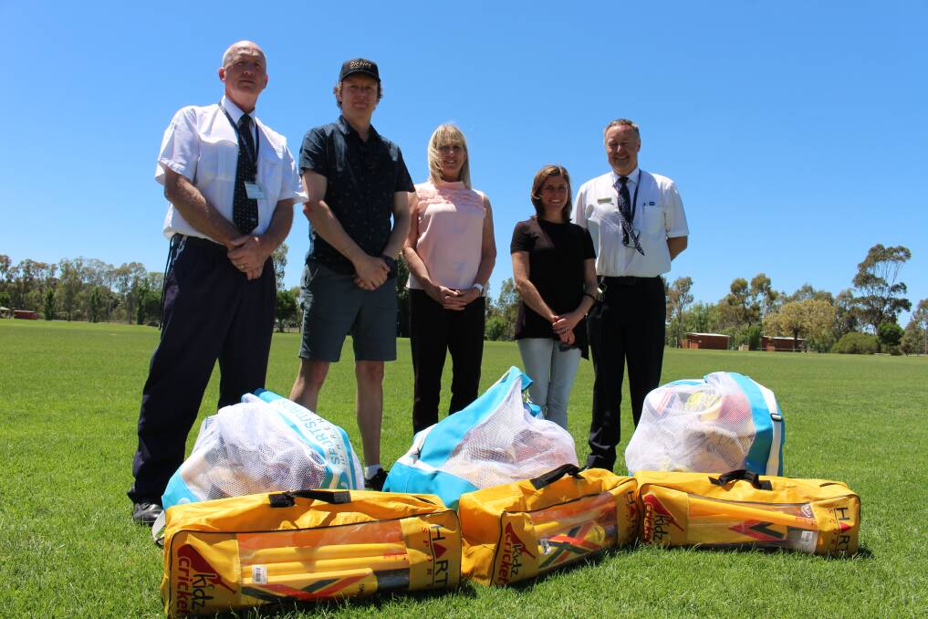 Offender services manager Trevor Coles, Jim Ross, assistant principal of St Joseph's Junee, Kay Thurston, principal of Junee North, Alex Sheridan from Junee Public and Scott Brideoake, general manager of Junee Correctional Centre. 