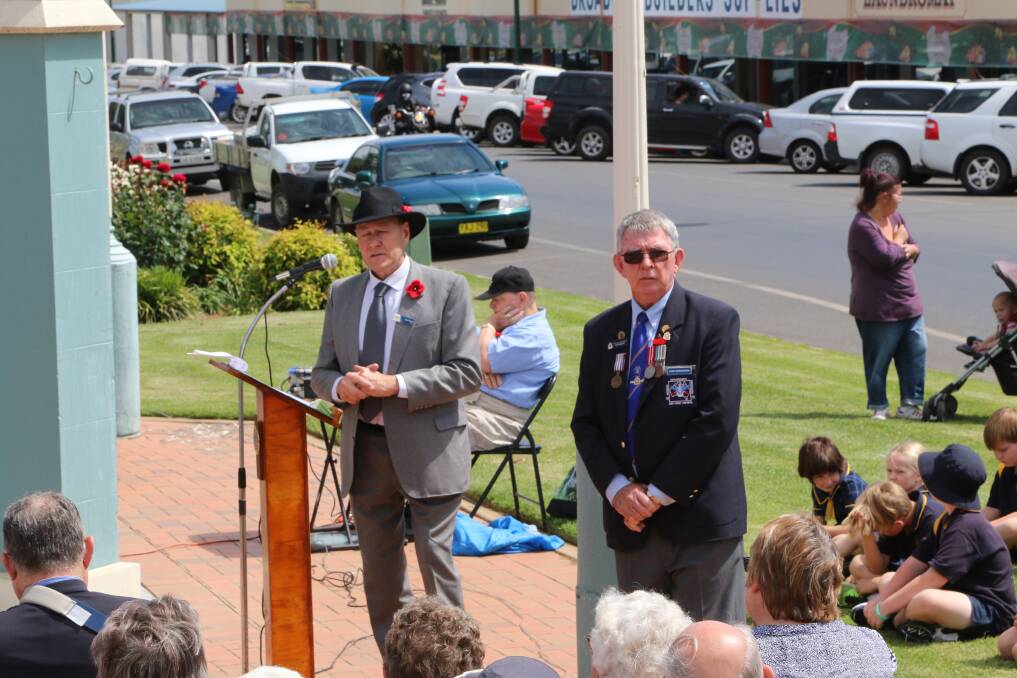 REMEMBRANCE DAY: The mayor and president of the Junee RSL sub branch address the crowd. Photo: Peter Neve