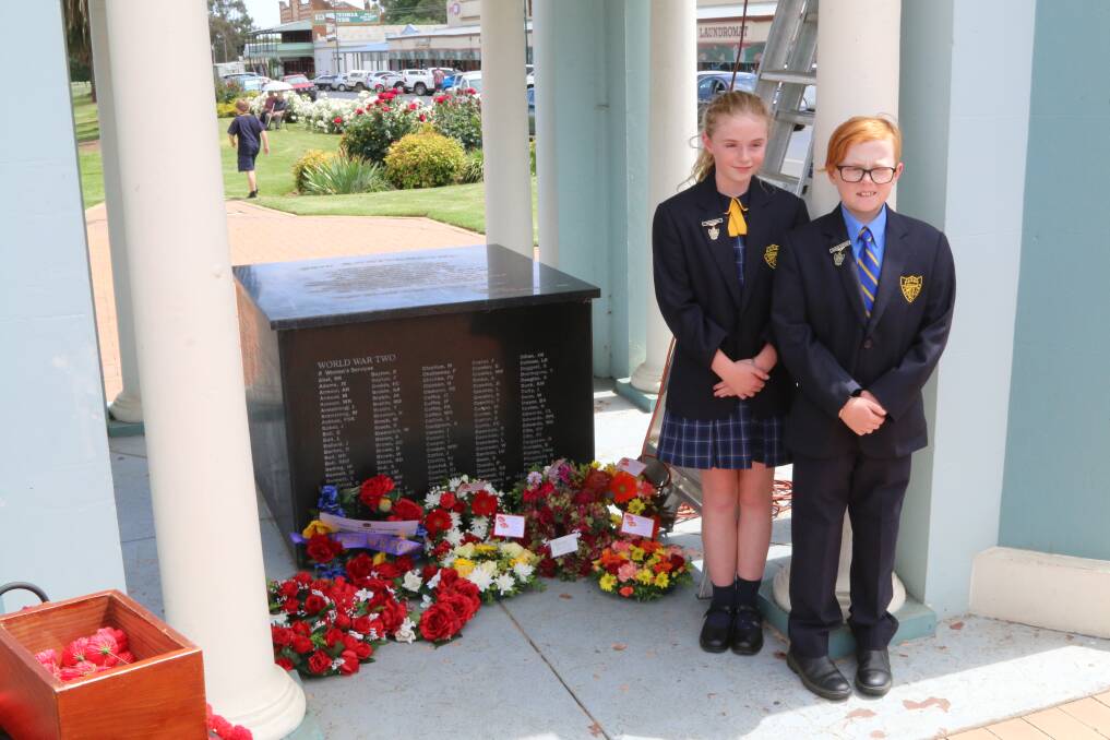 PAYING RESPECTS: Junee Primary School's captain and vice-captain. Photo: Peter Neve