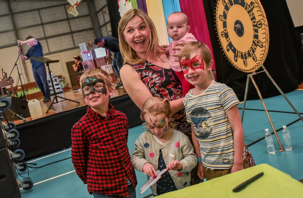 I LIKE TO SING: One happy young crew meet larger-than-life Justine Clarke. Picture: Struan Timms