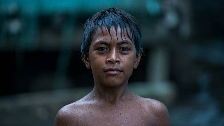 Micah Puia at Lord Howe Settlement in Honiara. Is he a climate change refugee? Photo: Penny Stephens