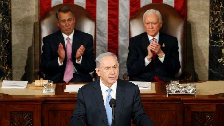 Damning of Obama's proposed nuclear deal with Iran ... Israeli Prime Minister Benjamin Netanyahu (centre) addresses a joint meeting of Congress in the House Chamber on Capitol Hill in Washington. Photo: JONATHAN ERNST