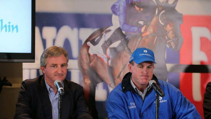 Colour run: John O'Shea (right) dons the Godolphin blue at last month's launch.  He had his first Sydney winner in the new gear on Wednesday. Photo: Anthony Johnson