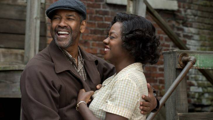 Denzel Washington plays Troy Maxson and Viola Davis plays Rose Maxson in <i>Fences</i>.