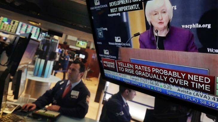 US Federal Reserve Chair Janet Yellen is expected to eventually raise interest rates, causing market volatility in the coming year. Photo: Richard Drew