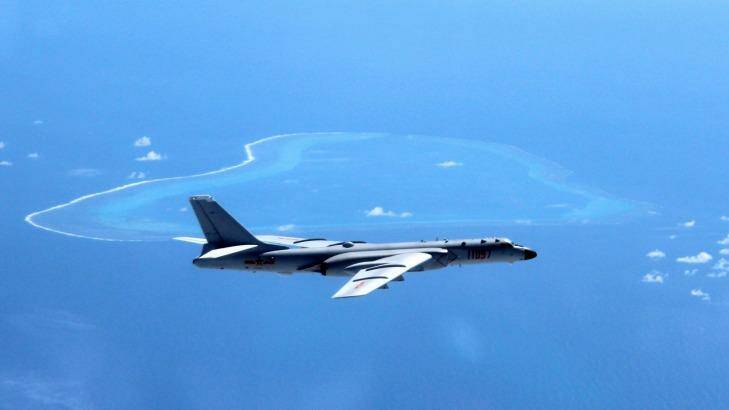A Chinese H-6K bomber patrols the islands and reefs in the South China Sea.  Photo: Xinhua/AP