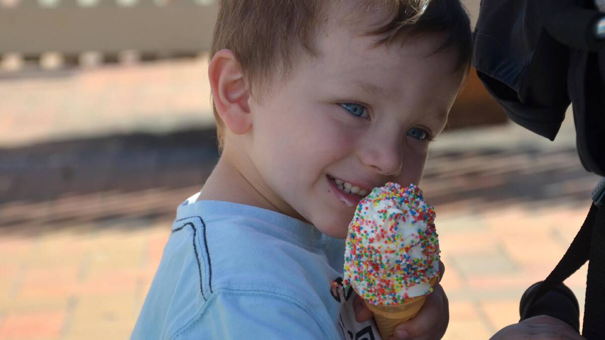 Levi Brown, 3 enjoys an icecream. Picture: Declan Rurenga