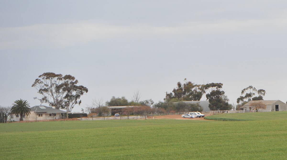 Police on the property near Boree Creek where four people, including three children,  were found dead on Tuesday. Picture: Laura Hardwick