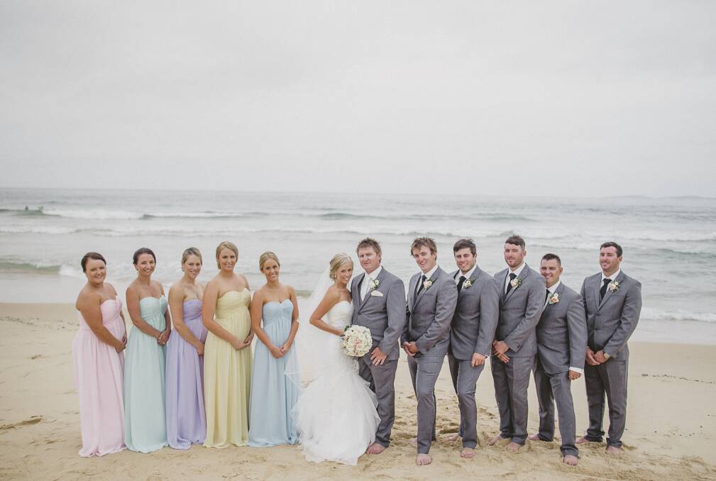 The bridal party at the wedding of Amanda Bond and Rhys Pertzel seaside at
Narooma. Picture: Dean Dampney