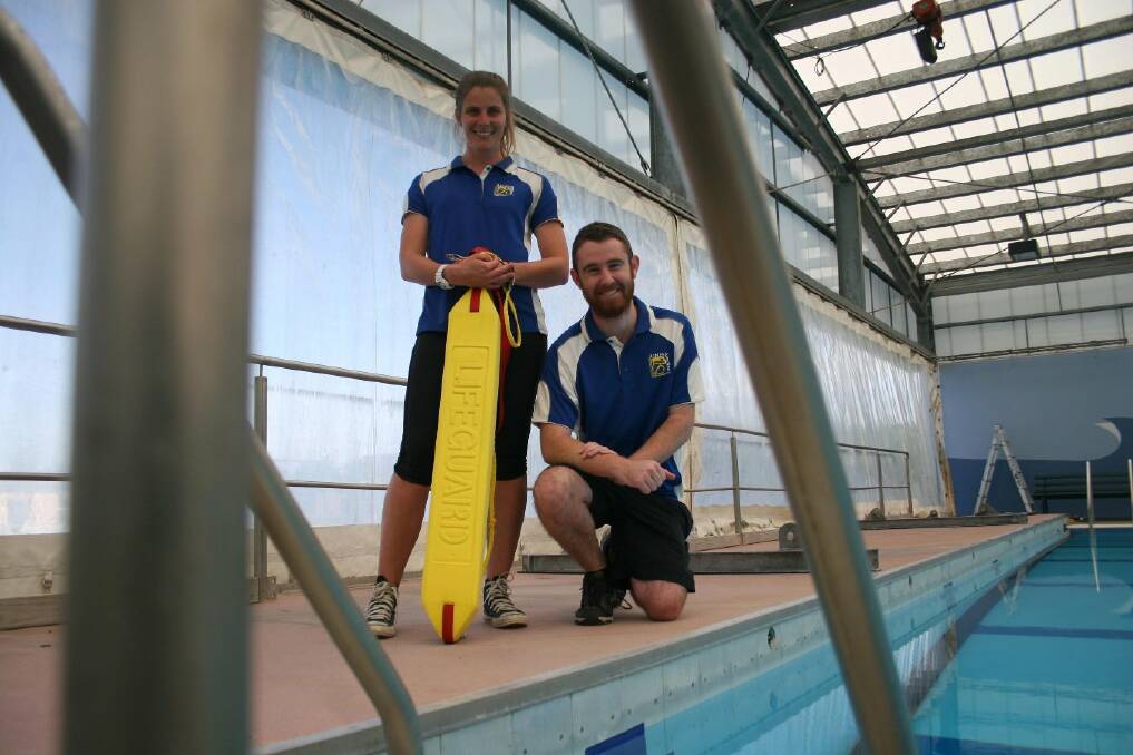 Junee Recreation Centre's low patronage mode will change the level of supervision for swimmers, but Helena Lyden and Ben Ross are among the staff ready to help out. Picture: Declan Rurenga
