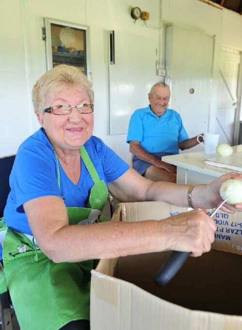 Illabo's Helen Harris and Clyde Belling work the kitchen at the Illabo Country Music Stampede. Picture: Kieren L Tilly