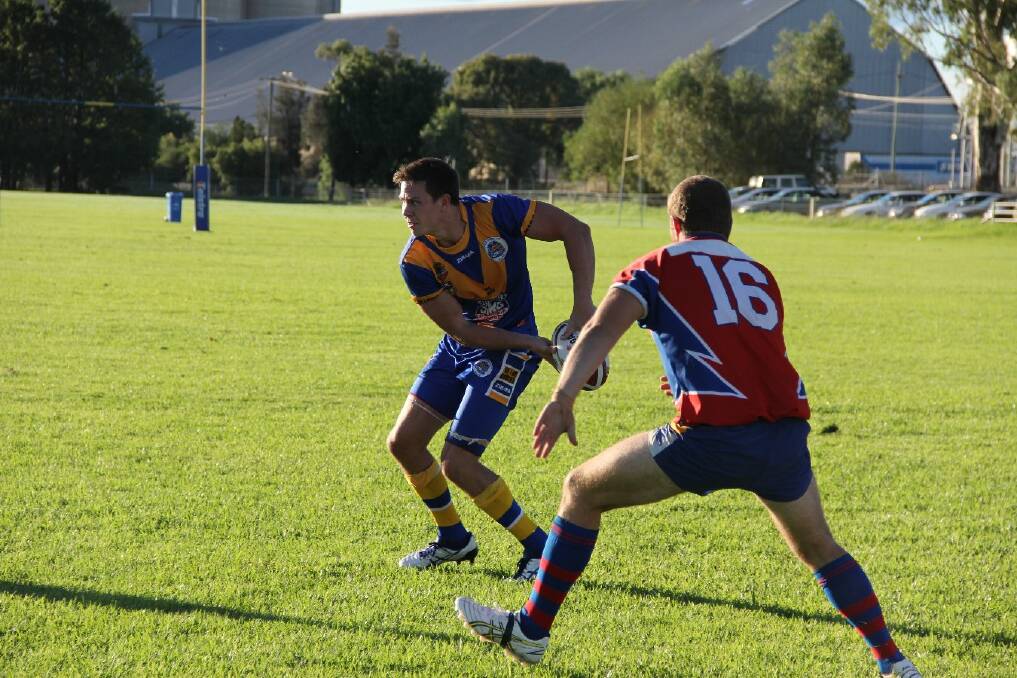 Matt Hands goes to off-load before being caught up by the Wagga Kangaroos. Picture: Liz Cowled