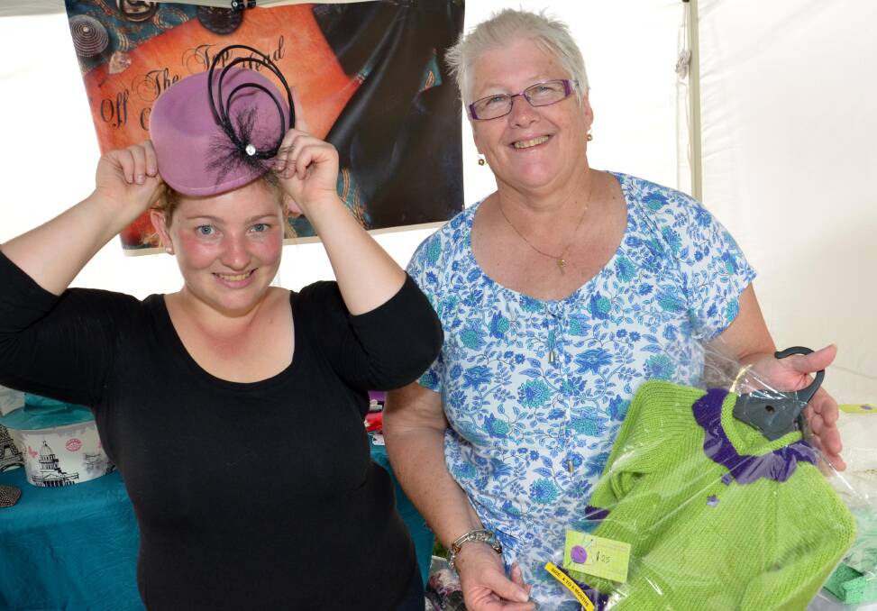Junee residents Megan Callow and Jackie Starr (right) among the stallholders at the Rhythm 'n' Rail Festival last year.