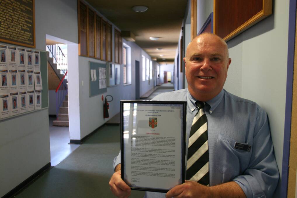 Junee High School's relieving principal Terry Vercoe is the newest life member for the NSW Combined High School's sporting association in recognition for his work in coaching rowers and organising the CHS competitions. Picture: Declan Rurenga