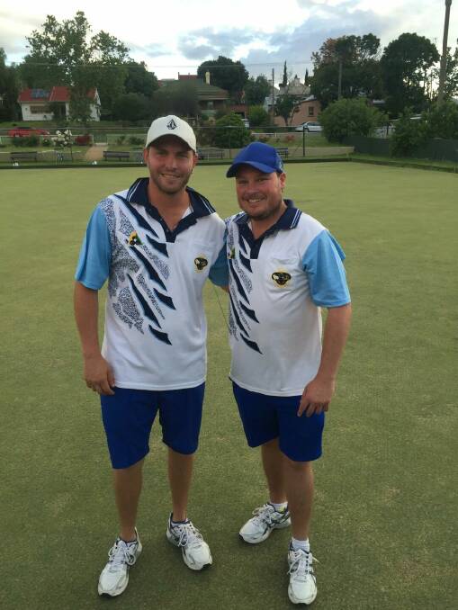 WINNERS: Craig Shaw and Nathan Charlton celebrate after winning the minor pairs championship. Picture: Robert Minister