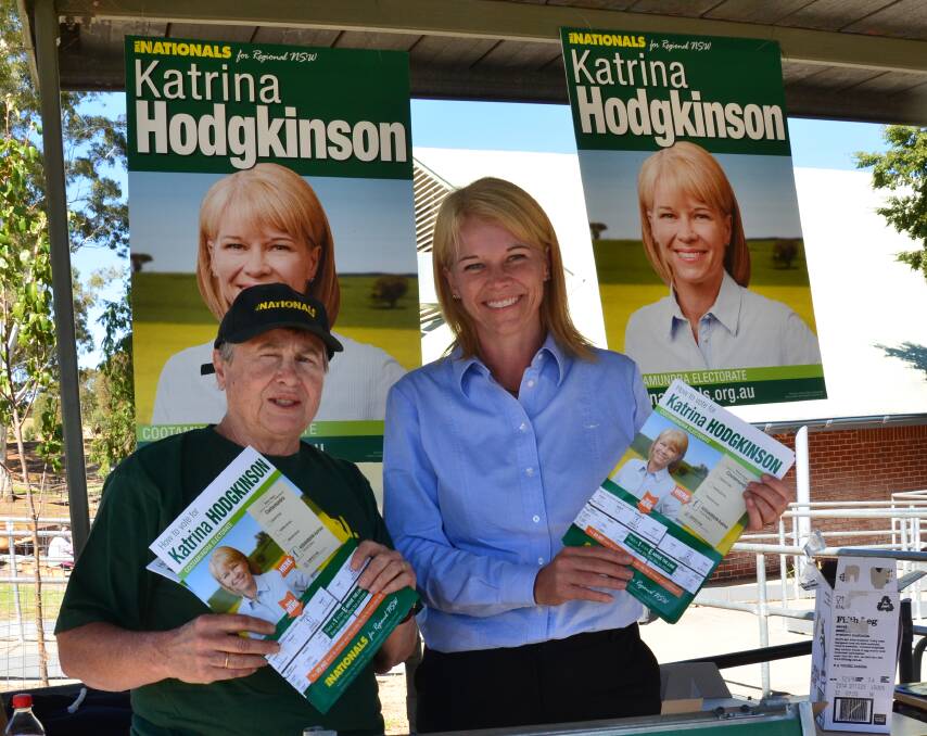 FLYING VISIT: Pam Halliburton and Katrina Hodgkinson campaign in Junee on election day. Picture: Declan Rurenga