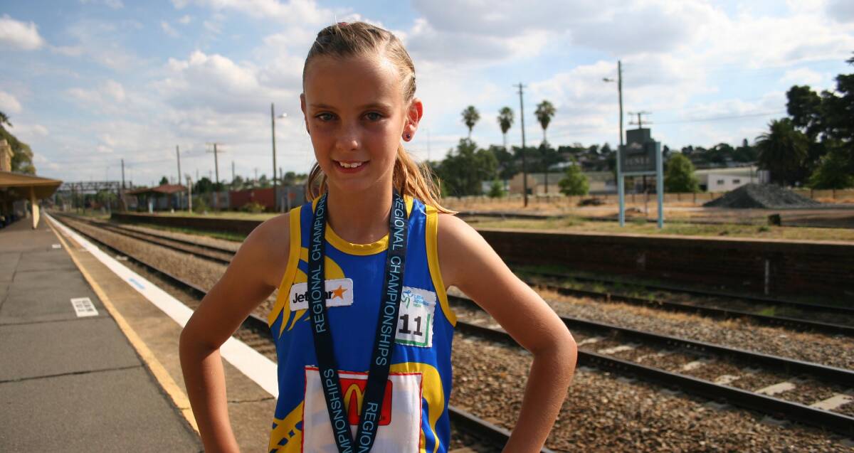 JUMPING HIGH: Grace Fahy, 11 will head to Sydney for the state titles in the 60m hurdle after competing in the regional championships in Leeton. Picture: Declan Rurenga