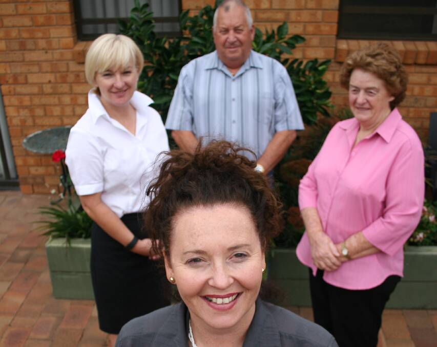 NEW FACE: Cooinda Court committee members Patricia Butler (back, left), Andy Walker and Magaret Hill welcome new manager Belinda Colgan.