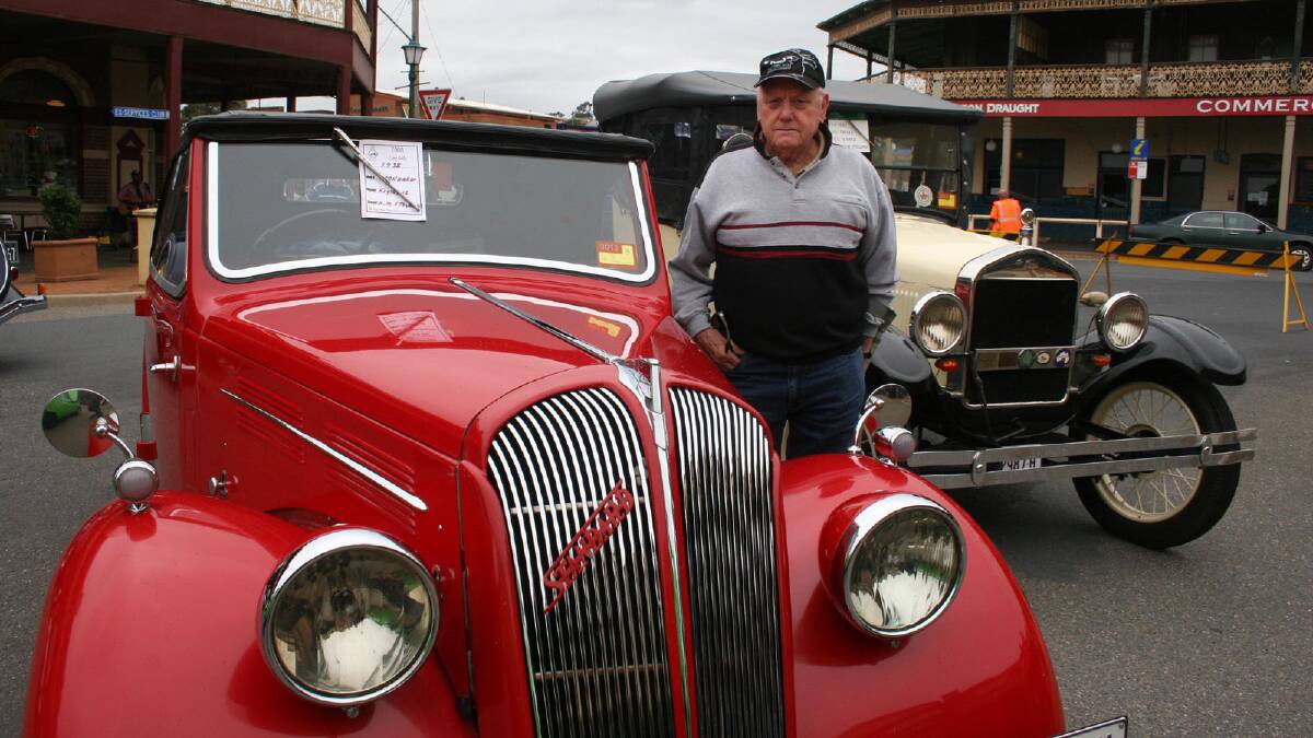 Selby and Maureen Fitzgerald own two vintage cars. The 1938 red Standard Flying 12 (left) is Maureen's and the 1927 Model T is Selby's.