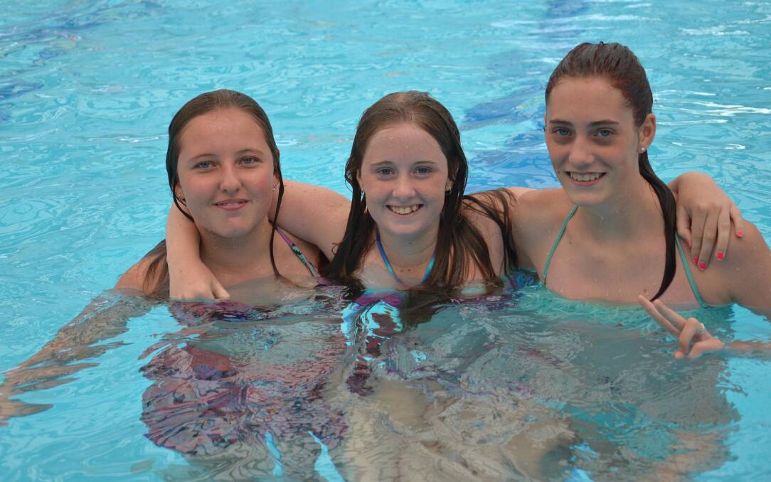 Letitia Currie, 14 (left), Rachel Oates, 14 and Kaitlyn McRae, 14. Australia Day in Junee. Picture: Declan Rurenga