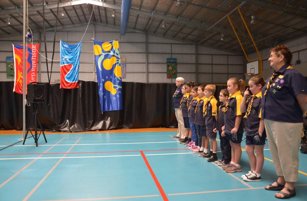 1st Junee line up to raise the flag. Australia Day in Junee. Picture: Declan Rurenga