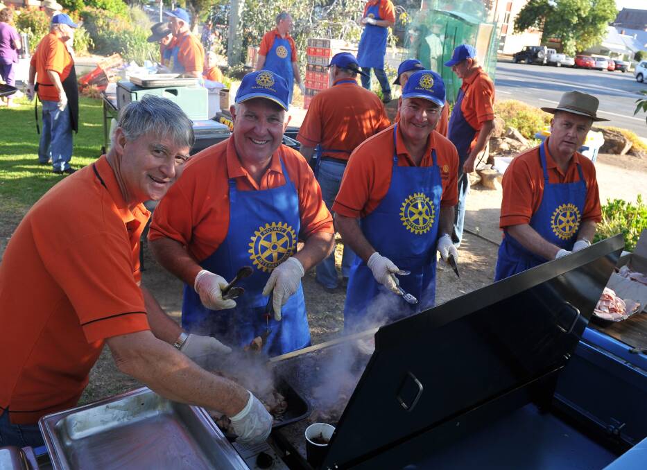Kooringal Rotary members on the barbie John Roberson, Kevin Pascall, Richard Pottie and Wayne Hooper at the Wagga Australia Day breakfast and citizenship ceremony. Picture: Michael Frogley