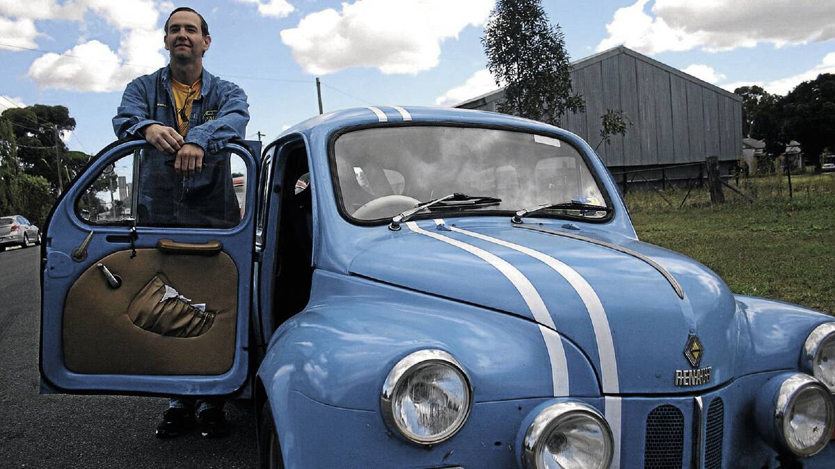 Renault Owners Club of North America Marvin McFalls checks out a modified 4CV during the Australian 4CV Register's muster in Junee. Picture: Declan Rurenga