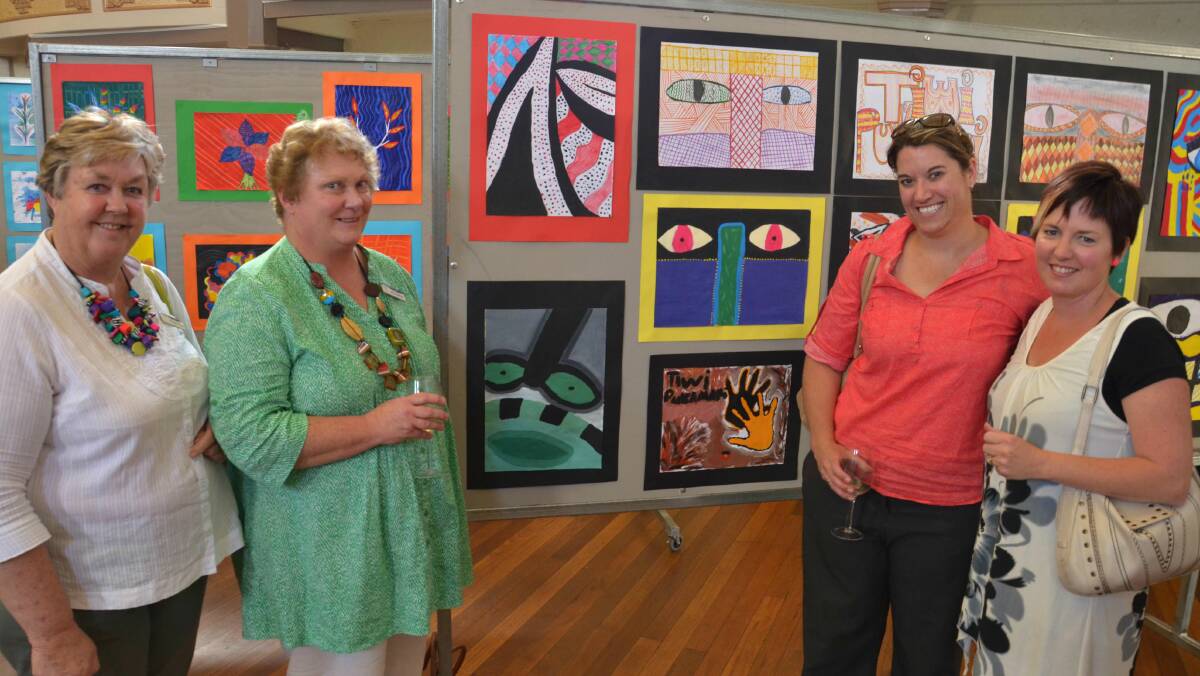 Margaret Drum, Jane Addison, Kellie Salmon and Renee O'Connell from St Joseph's Primary School look over the art work. Picture: Declan Rurenga