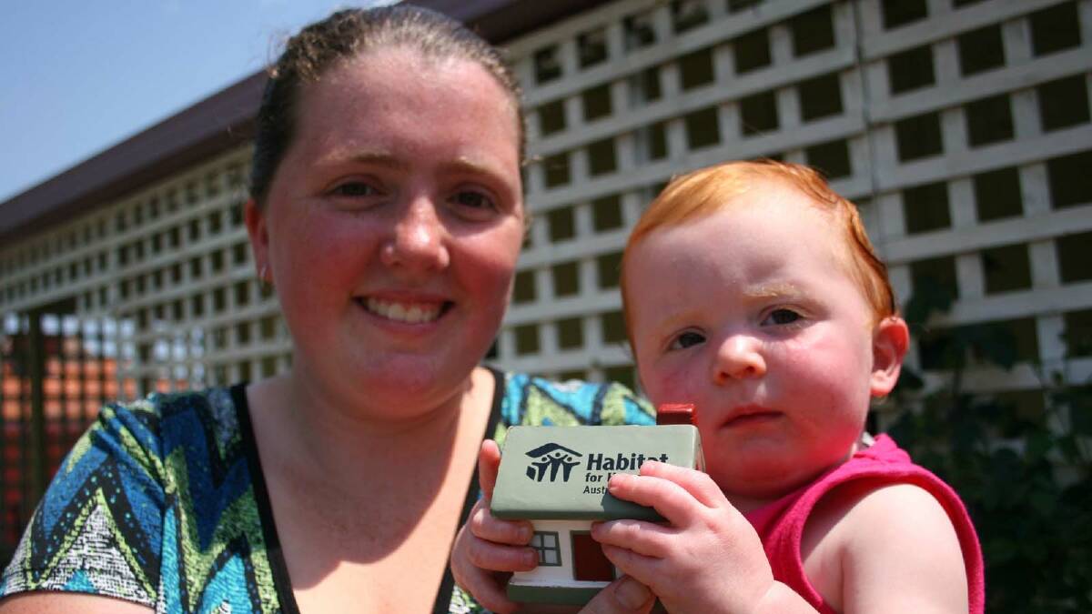 NEW START: Junee resident Emily Bollingmore and her daughter, Chloe, 11 months will be moving into the second Habitat for Humanity Riverina Prisonbuild house. Picture: Declan Rurenga