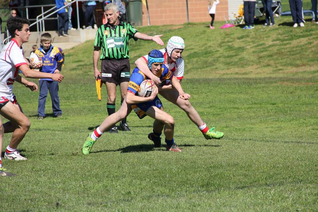 Joe Field gets tackled by Temora during the Diesels win against the Dragons. Picture: Liz Cowled