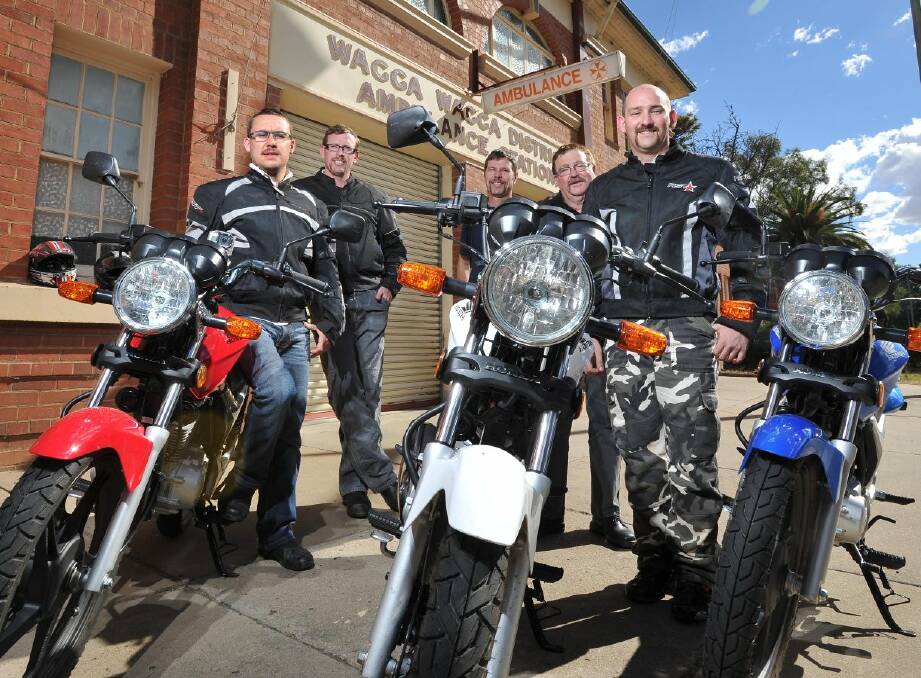 Paramedics (from left) Ian Pollard, Michael Everett, Peter Dawson, Robert Crampton and Luke Randall stop off in Wagga on their way to Broken Hill by motorbike to raise awareness and funds for Movember. Picture: Michael Frogley