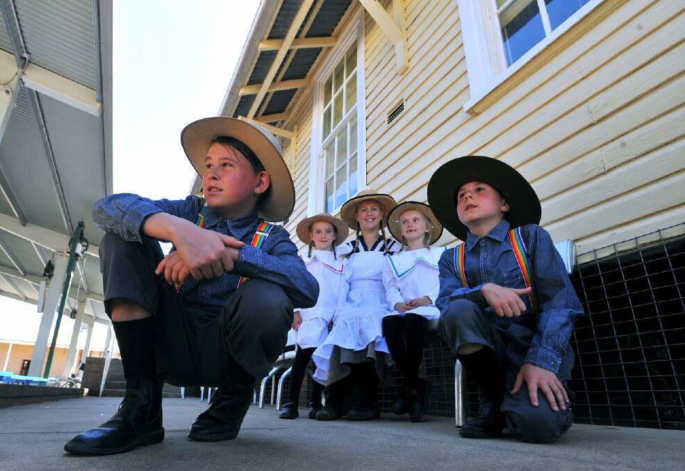 Rural Commemorative Children’s Choir members (from left), Brandon Shepherd, 9, Maeve Ryan, 5, Mae- Rose Harrison, 11, Emily Ryan, 7, and Zyon Shepherd, 11 will take centre stage at the launch of the Kangaroo March reenactment on Saturday in Wagga. Picture: Addison Hamilton