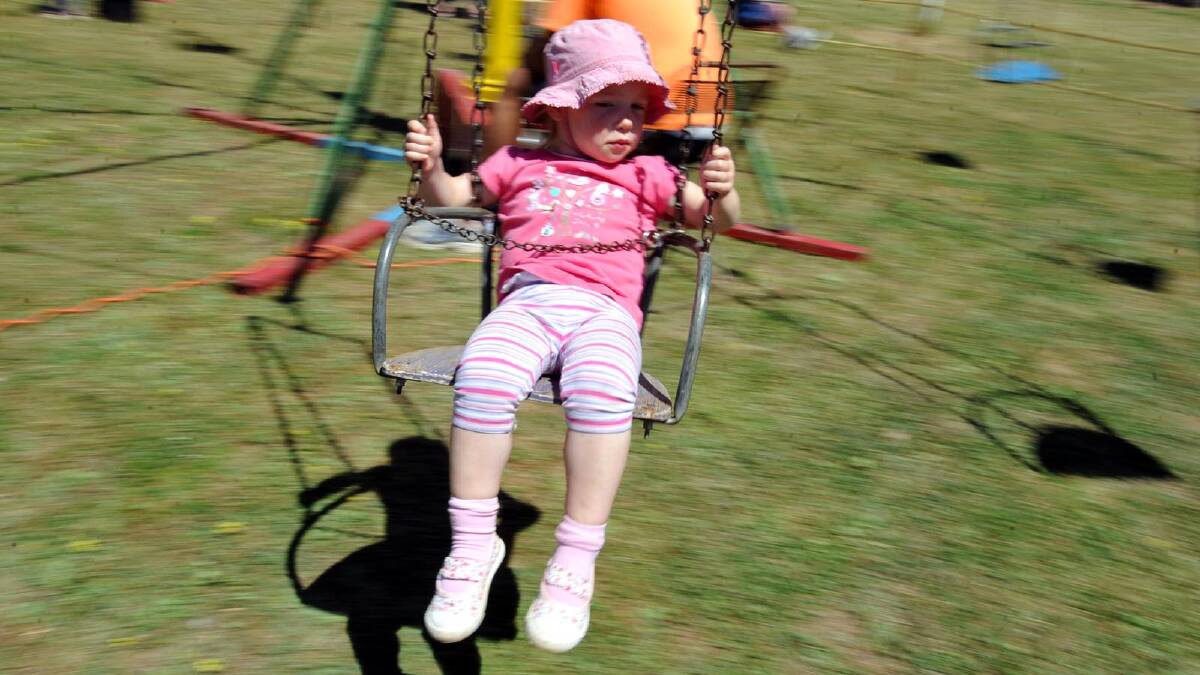 Illabo Show -  Amelia Herrett, 2, of Canberra gets into the swing of things. Picture: Les Smith