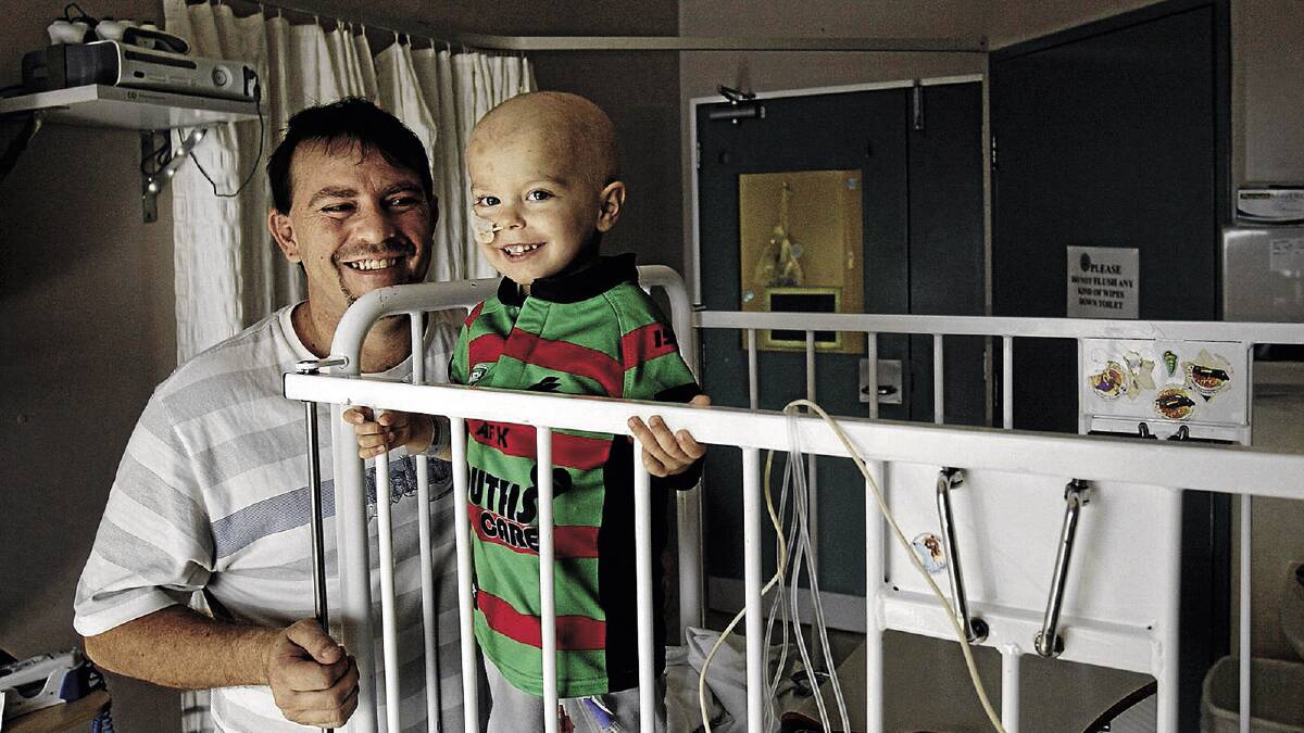 TOUGH ROAD: Despite being limited to the John Hunter Hospital in Newcastle for his cancer treatment, Bailon (right) and Randy Johnson can still share a smile. Picture: Newcastle Herald