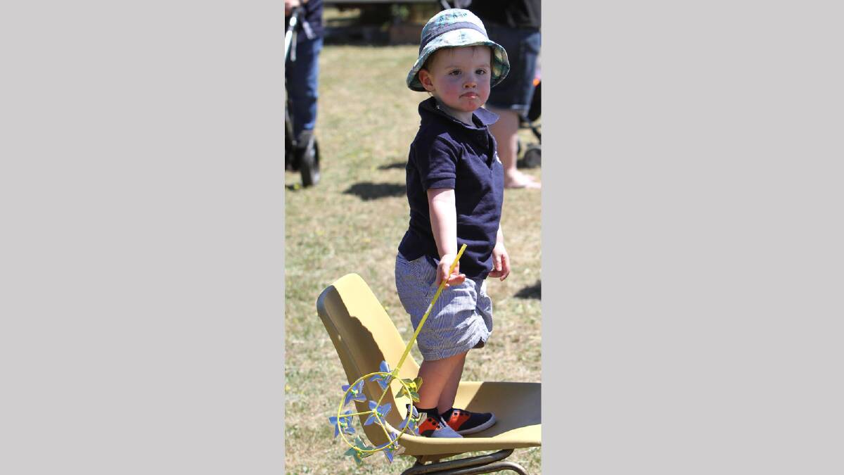Illabo Show -  Hamish McRae, 2, gets a little higher for a sneak peek at all the activities. Picture: Les Smith