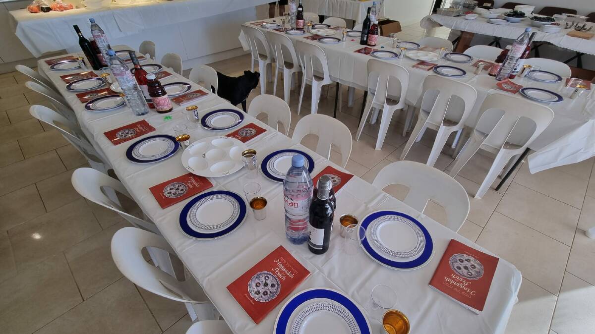 Rabbi Aron and volunteers from Chabad of RARA set up Seder tables for events around Australia including Alice Springs. Picture supplied