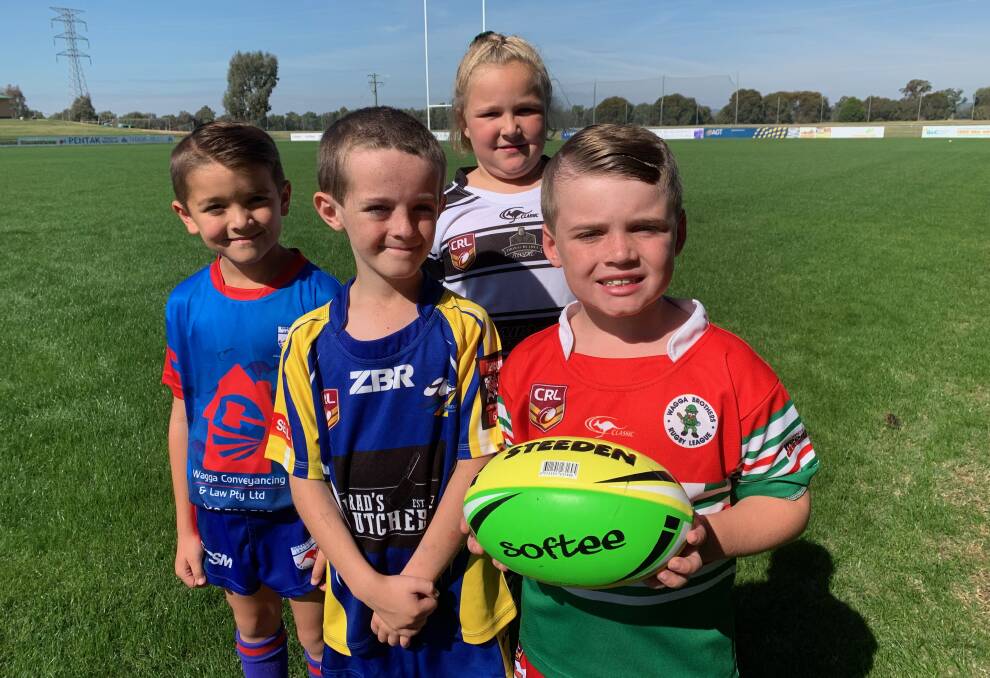 BIG STAGE: Under eights rugby league players will play at half-time of next week's Raiders-Panthers NRL clash in Wagga. Front (from left) Kai Hillier (Wagga Kangaroos Red), Joe Bradley (Junee Diesels), Nate Williams (Wagga Brothers) and (back) Angel Krause (Wagga Magpies).