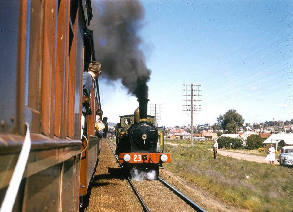 ALL ABOARD: Fanny parallels the vintage train, leaving Junee on September 23, 1961. Photo: Peter Neve OAM