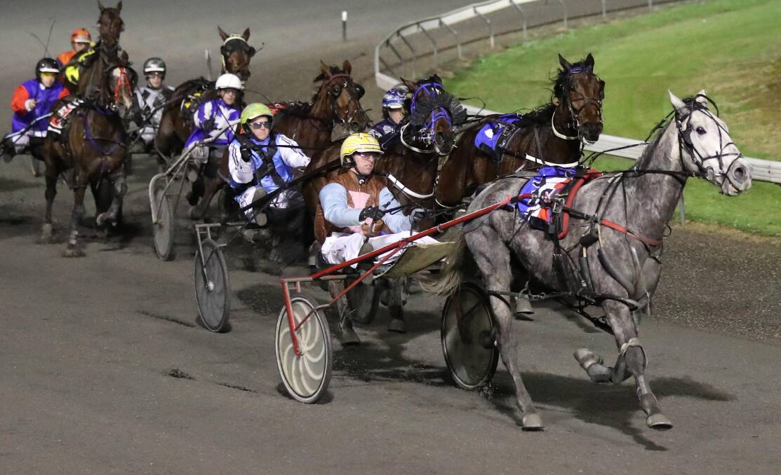 ON SONG: Junee reinsman Cameron Hart steers Split Second Lombo to victory at Wagga on Tuesday, his second of three wins for the night. Picture: Les Smith