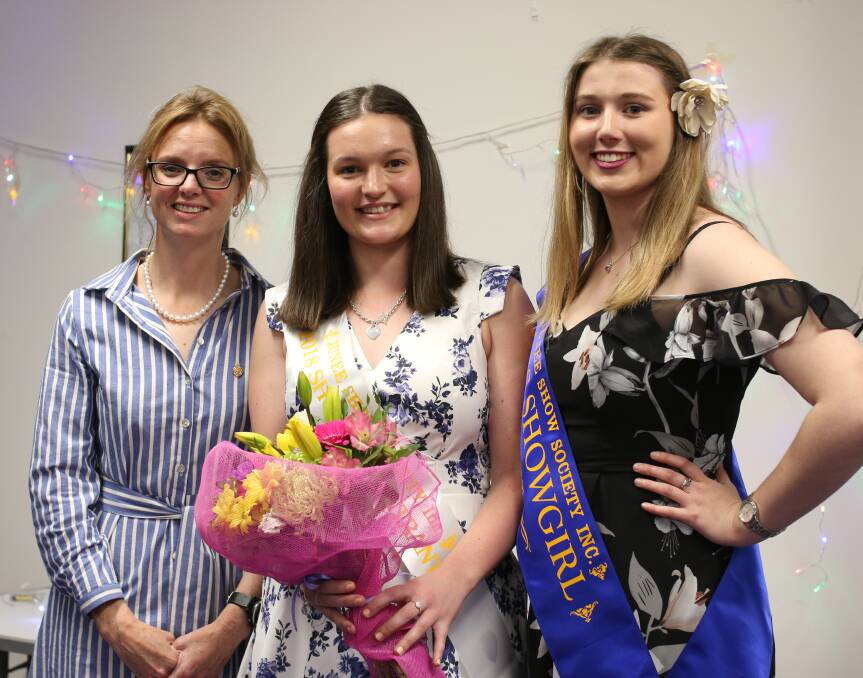 Showgirl: 2018 entrant Teagan McCormack (centre) is congratulated by Member for Cootamundra Steph Cooke (left) and 2017 Showgirl Hannah Turner.