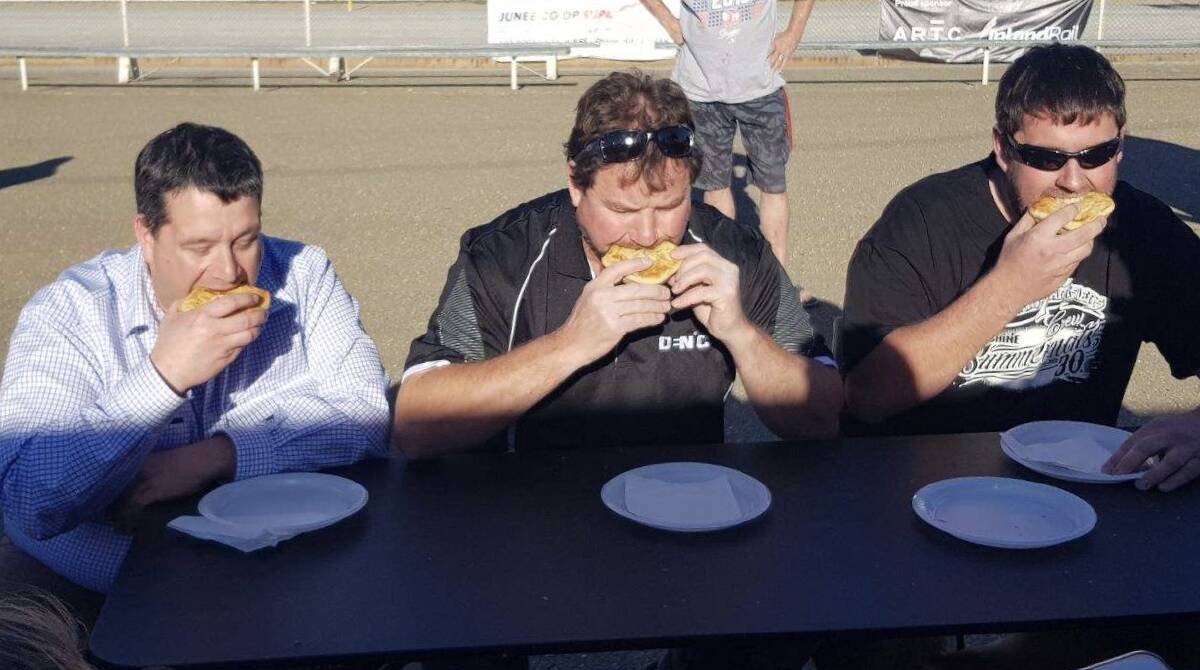 LET'S EAT: Getting into the spirit of the inaugural Junee Show pie-eating competition last year were (from left) Matt Austin, Brett Duck and Andrew Coen.